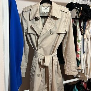 Banana Republic Trench Coat. Classy simple details. Thick material. Size M